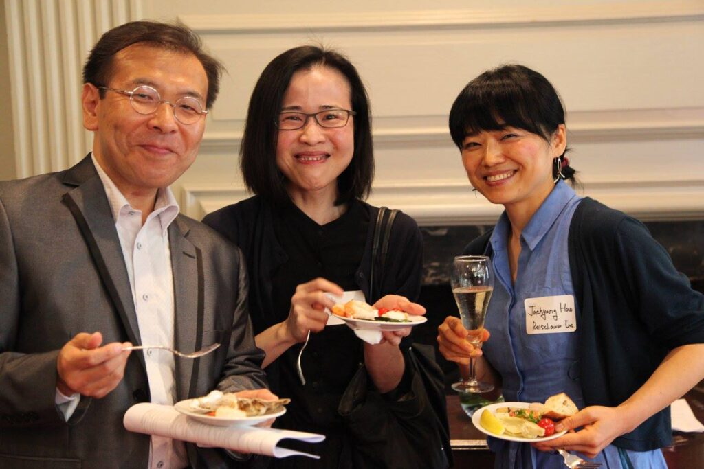 Prof. Chikamoto poses with two other Visiting Scholars