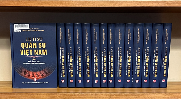 14 volumes of the book displayed on a shelf